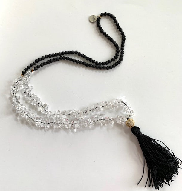 Tassel necklace with clear quartz and black lava beads, pave cz gold plated guru bead, black silk tassel,