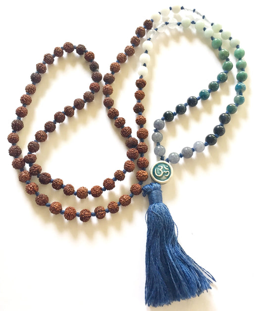 Rudraksha and green jade mala with an Om charm and a blue silk tassel after restringing