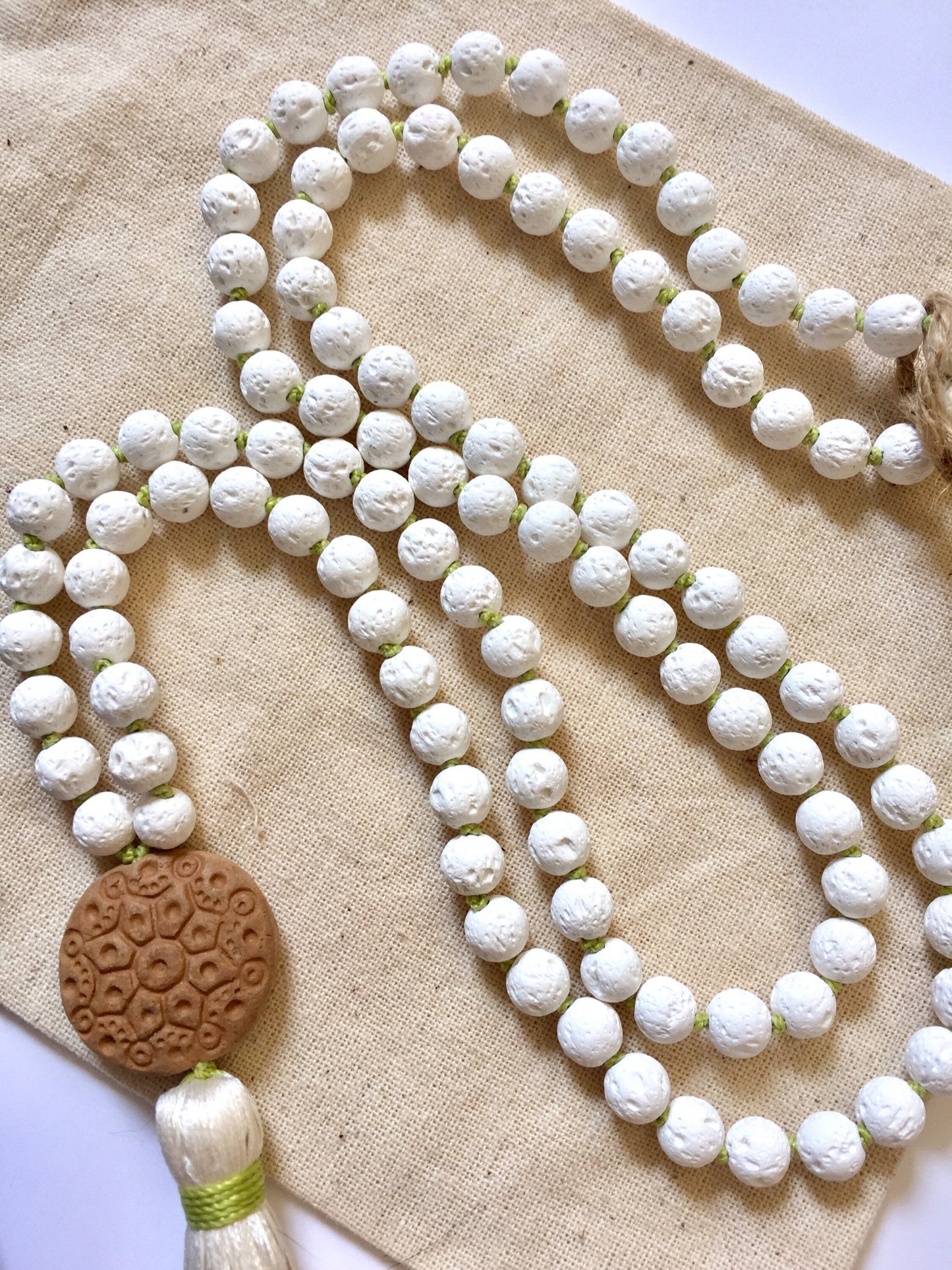 The Mala for Grounding, White Lava and Terra-cotta Oil Diffuser Guru Bead