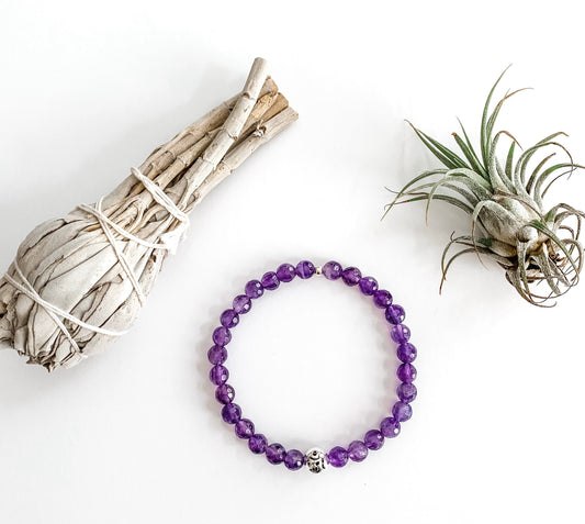 Amethyst beaded bracelet with sterling silver  Om  round ball bead charm