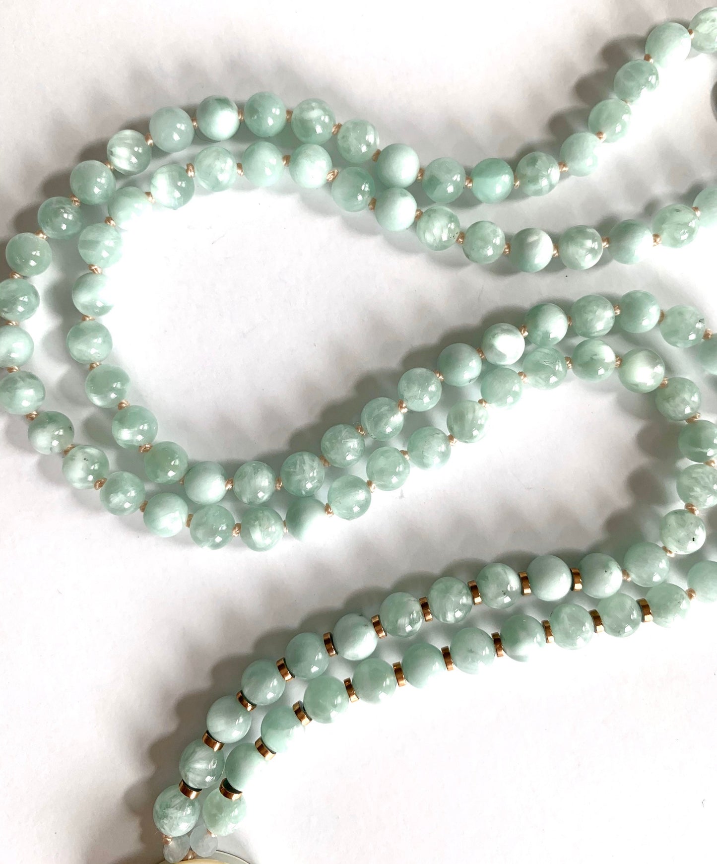 The Peaceful Buddha Mala, Green Angelite, Hematite and Mother of Pearl