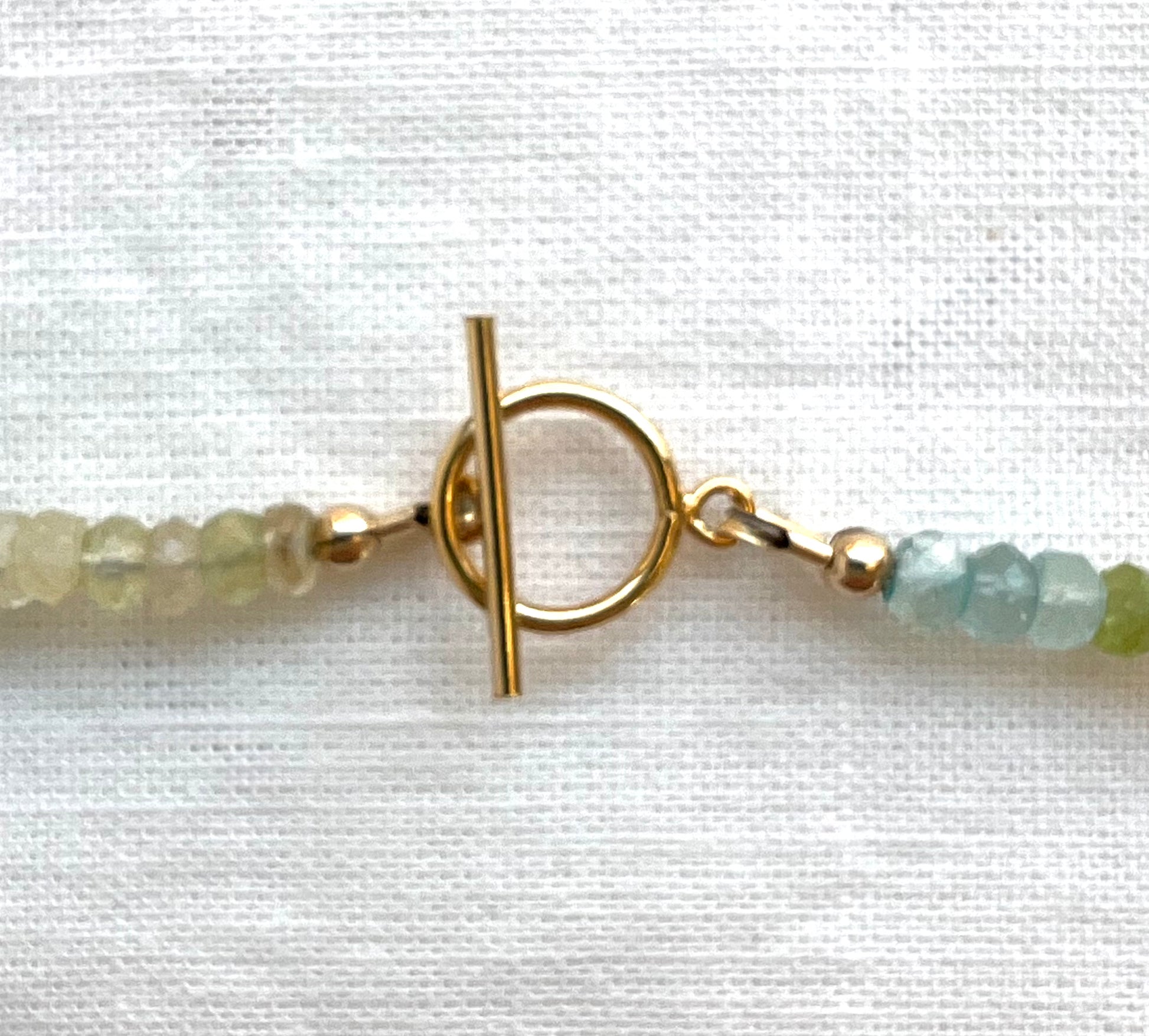 Handmade larimar and aquamarine necklace with a blue topaz accent