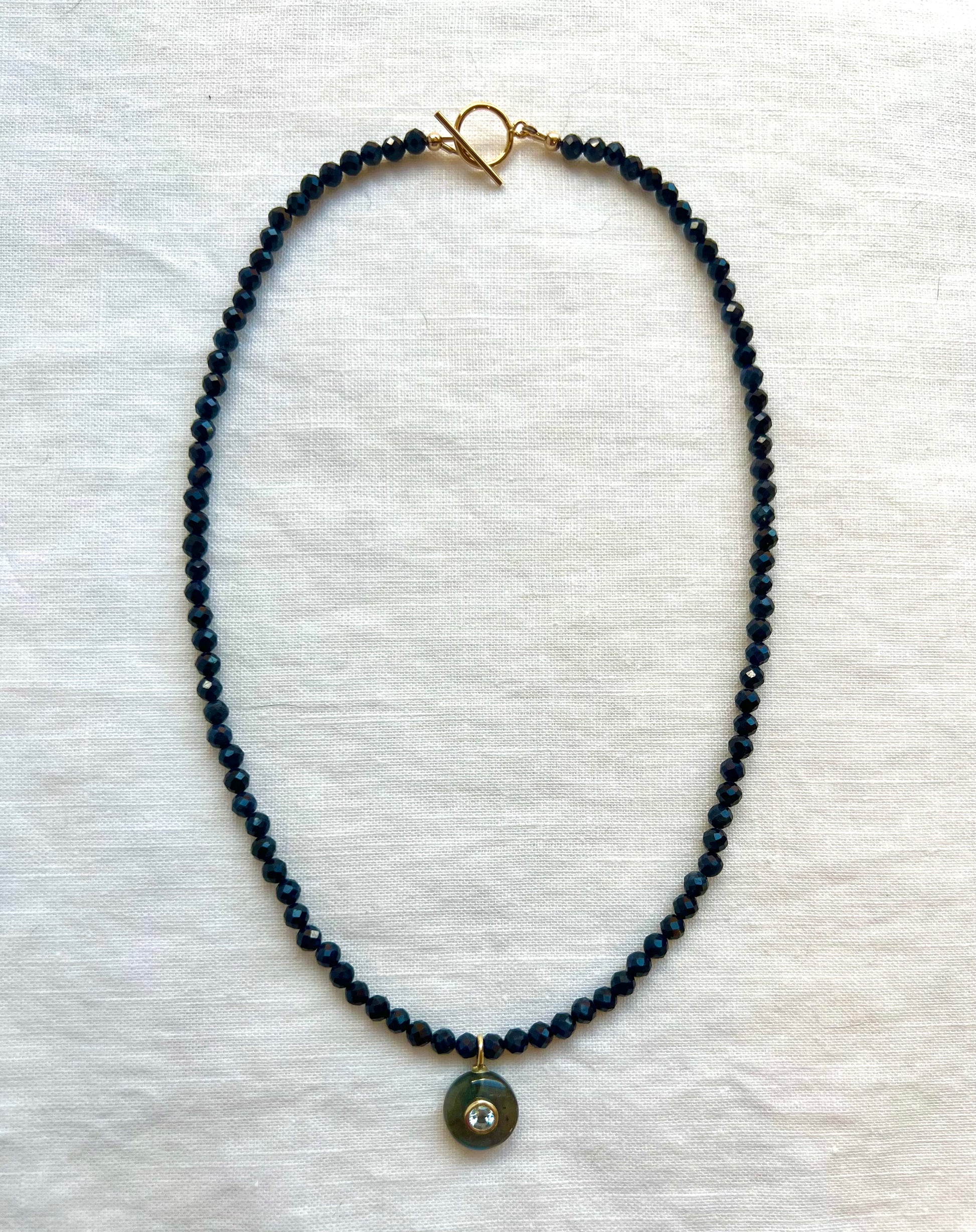 Handmade 16 inch blue sapphire necklace with gold filled findings and a labradorite drop