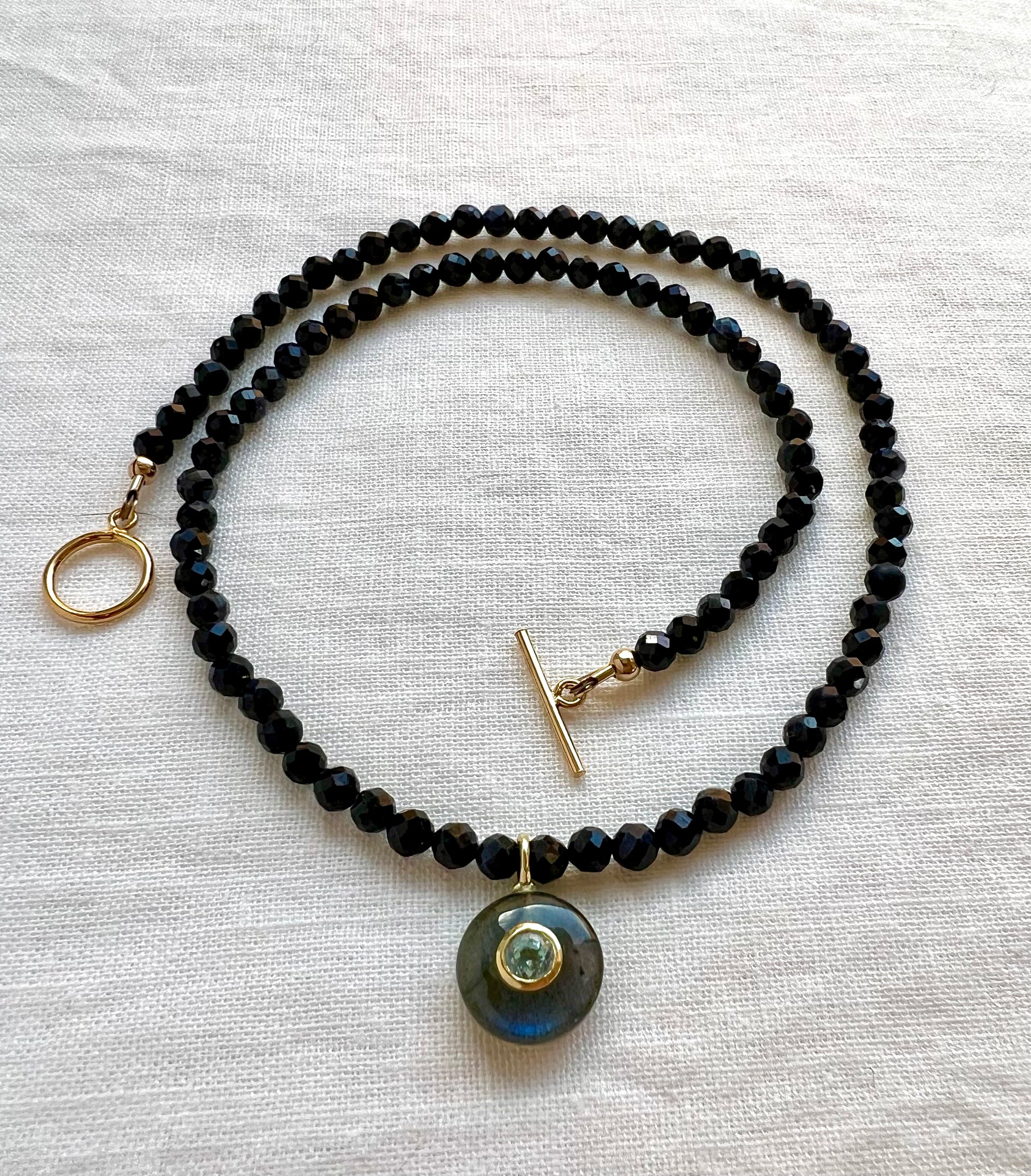 Blue sapphire beaded necklace with labradorite pendant and bezel set blue topaz, handmade by Lulu Beads Studio