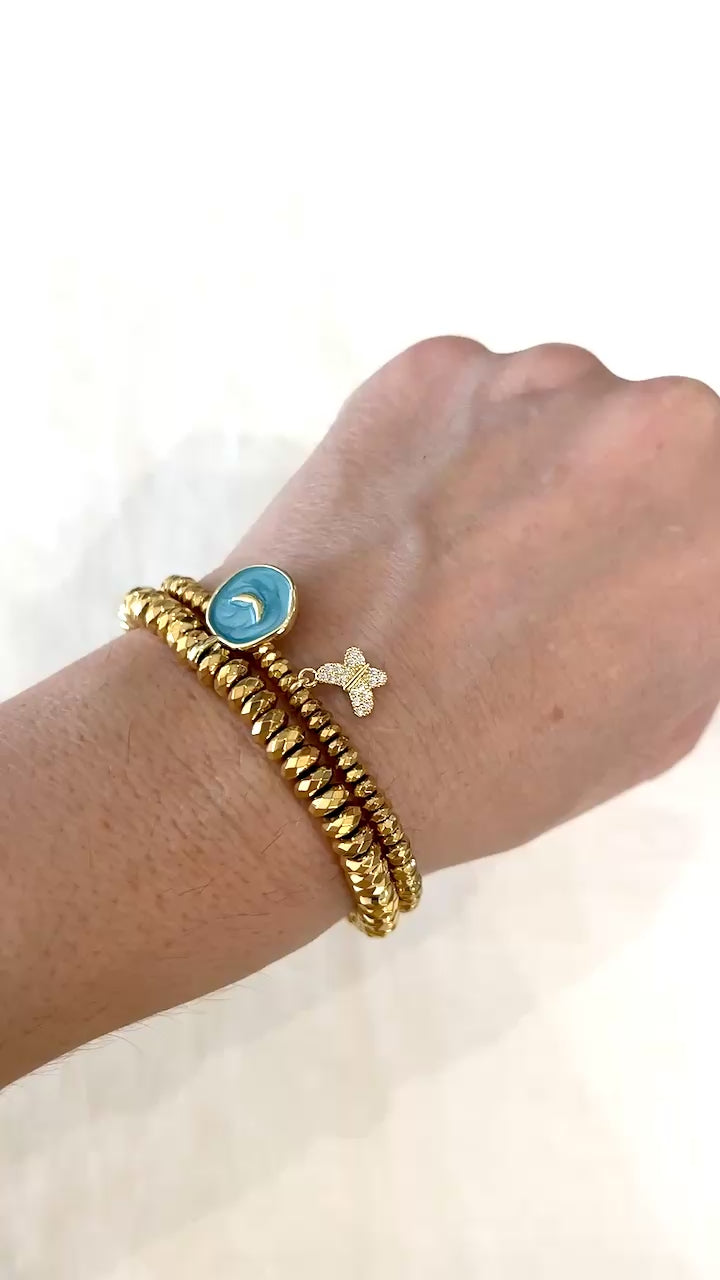 Video of the Earth Angel bracelet worn stacked with a dainty gold hematite butterfly bracelet