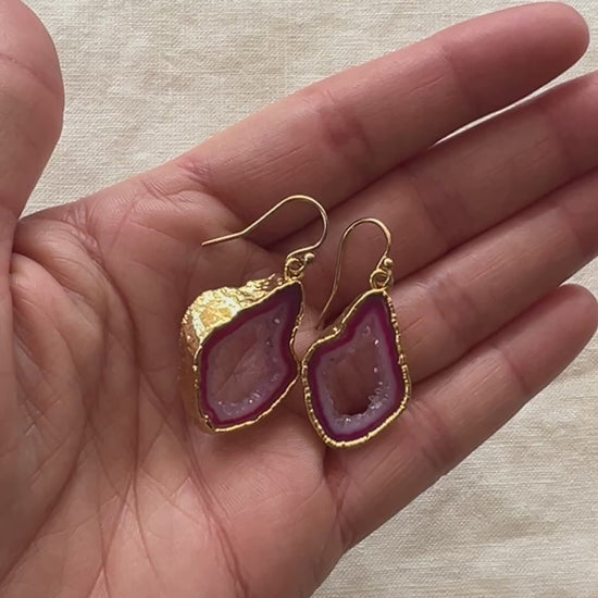 Video of the pink agate slice geode earrings turning in the light
