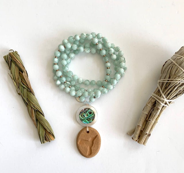green Angelite mala necklace with mother of pearl guru bead and terra cotta oil diffuser hummingbird  pendant,