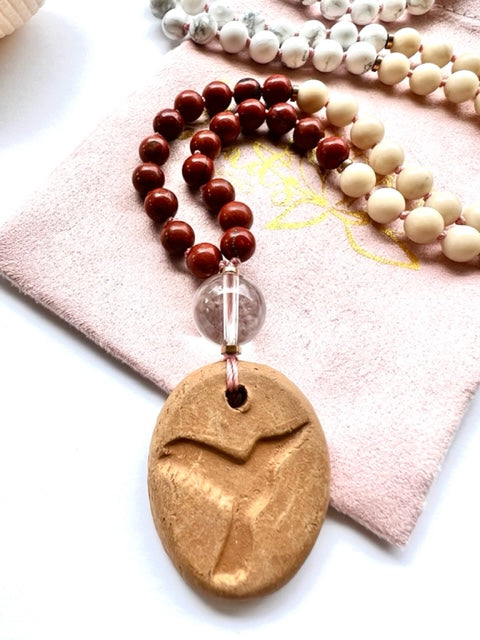 mala necklace, 6mm red jasper, riverstone, and howlite jasper, quartz guru bead and terra cotta hummingbird oil diffuser amulet