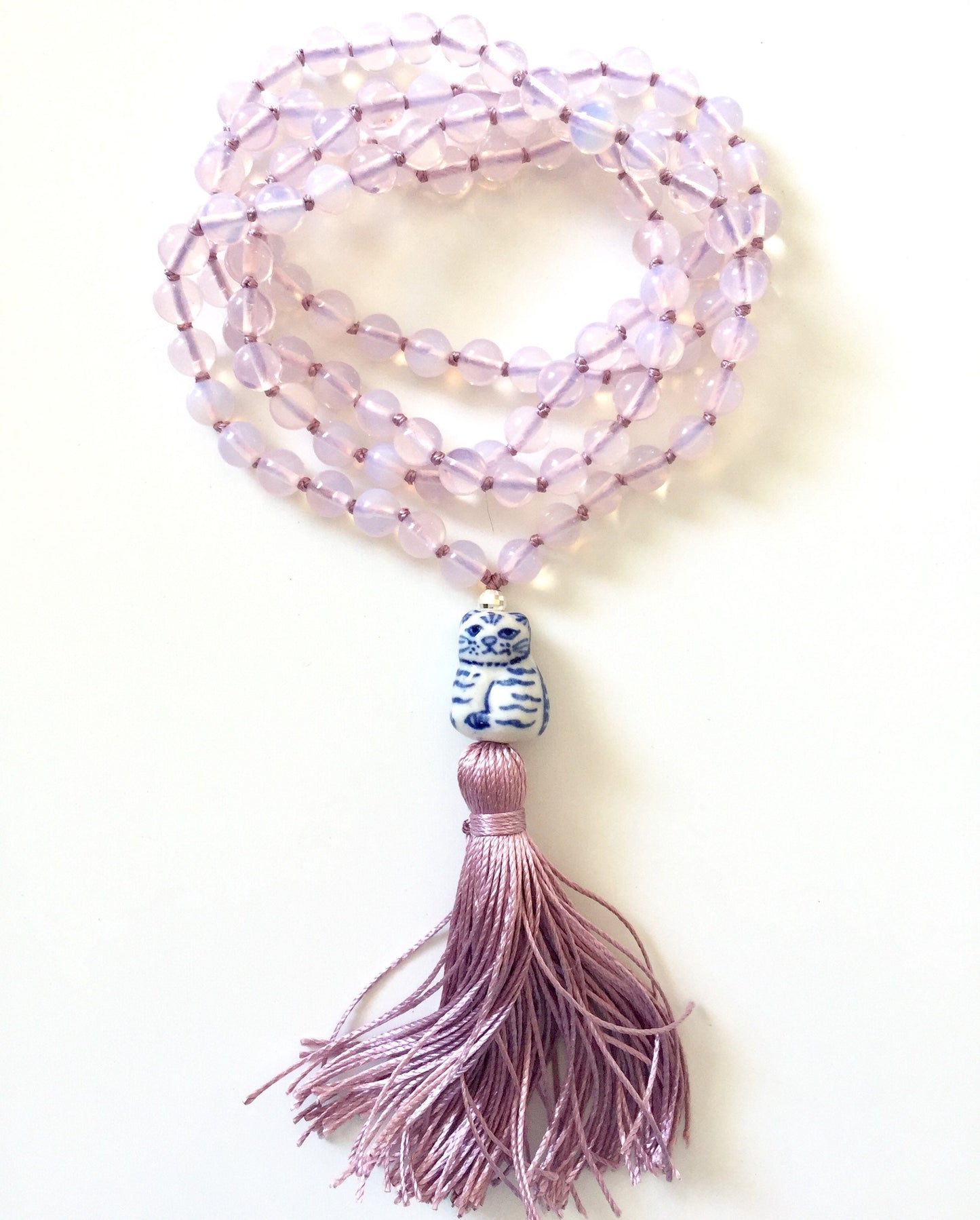Opalite Mala Necklace with blue and white ceramic cat guru bead and lavender tassel