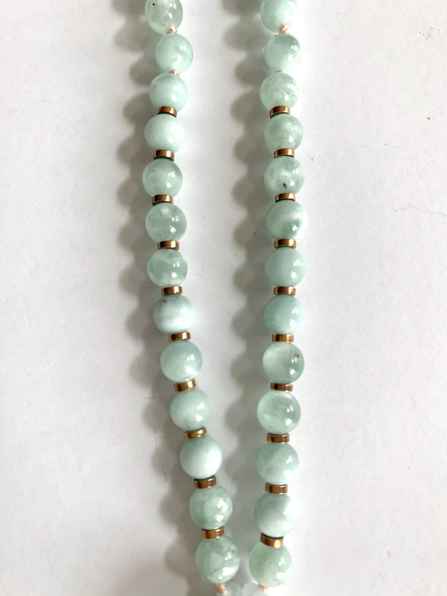 The Peaceful Buddha Mala, Green Angelite, Hematite and Mother of Pearl