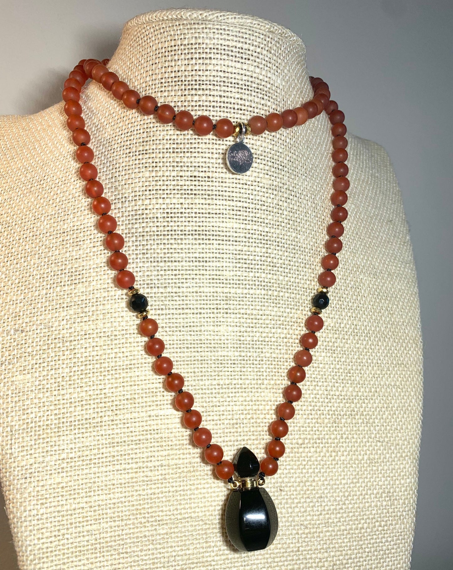 The Life Force Mala, Carnelian, Hematite and Miniature Onyx Perfume Bottle Pendant