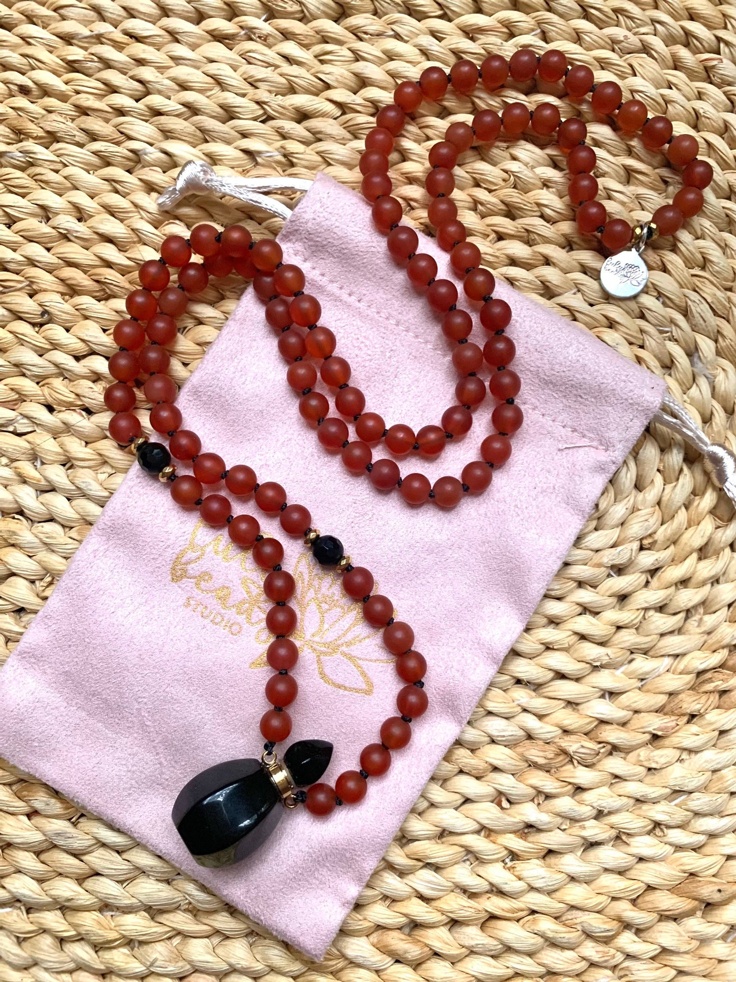 The Life Force Mala, Carnelian, Hematite and Miniature Onyx Perfume Bottle Pendant