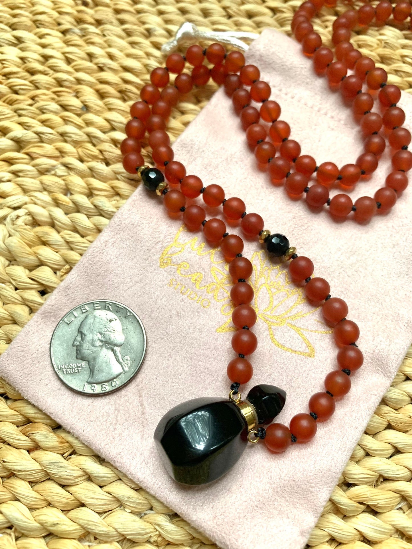 The Life Force Mala, Carnelian, Hematite and Miniature Onyx Perfume Bottle Pendant