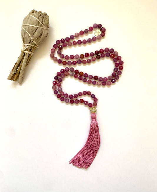 Multi toned Ruby Mala necklace with pink silk tassel and gold plated cz guru bead